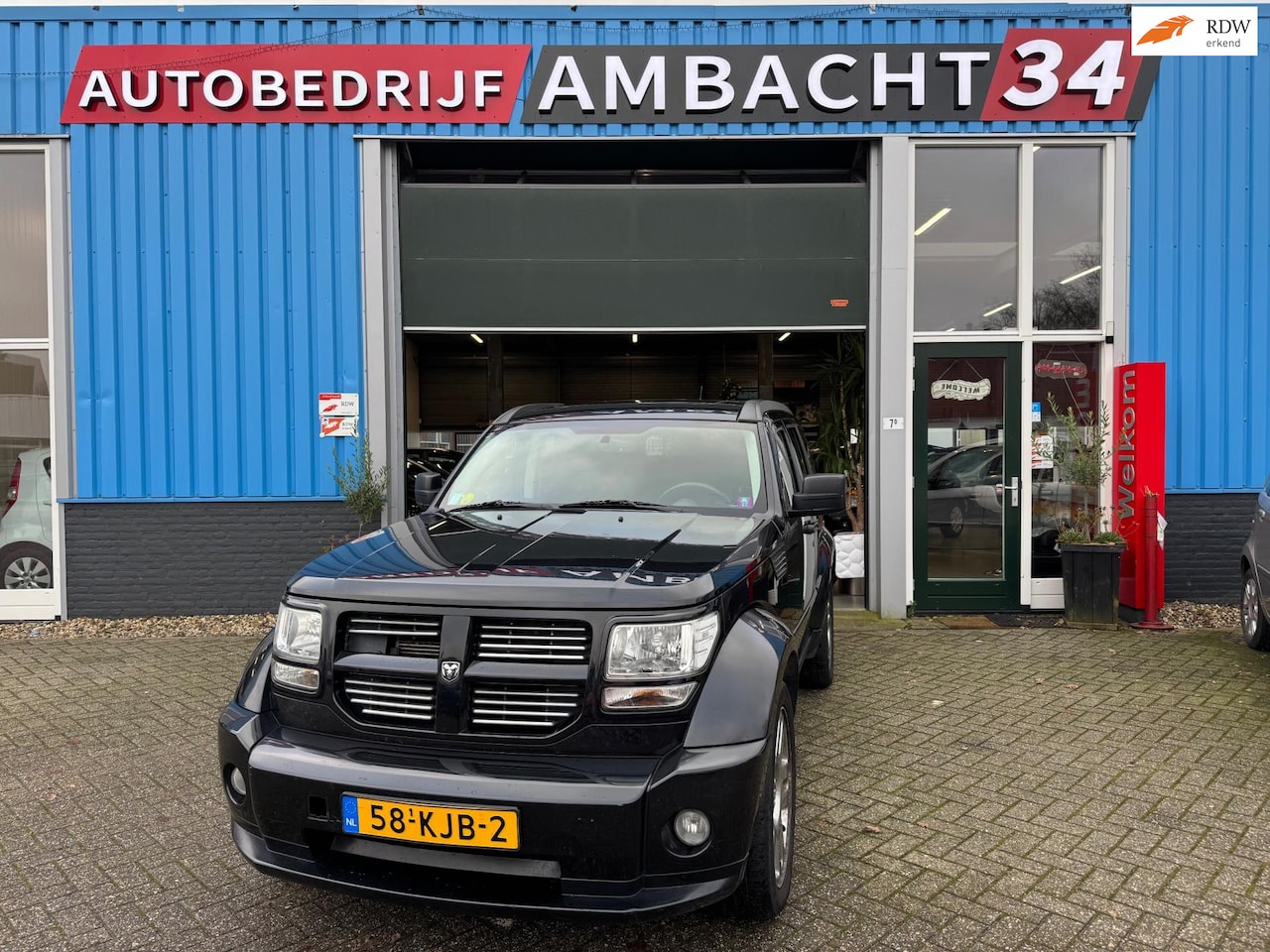 Dodge Nitro - 4.0 V6 R/T | Airco | Parksensor | Pano | Cruise control | EX BPM - AutoWereld.nl