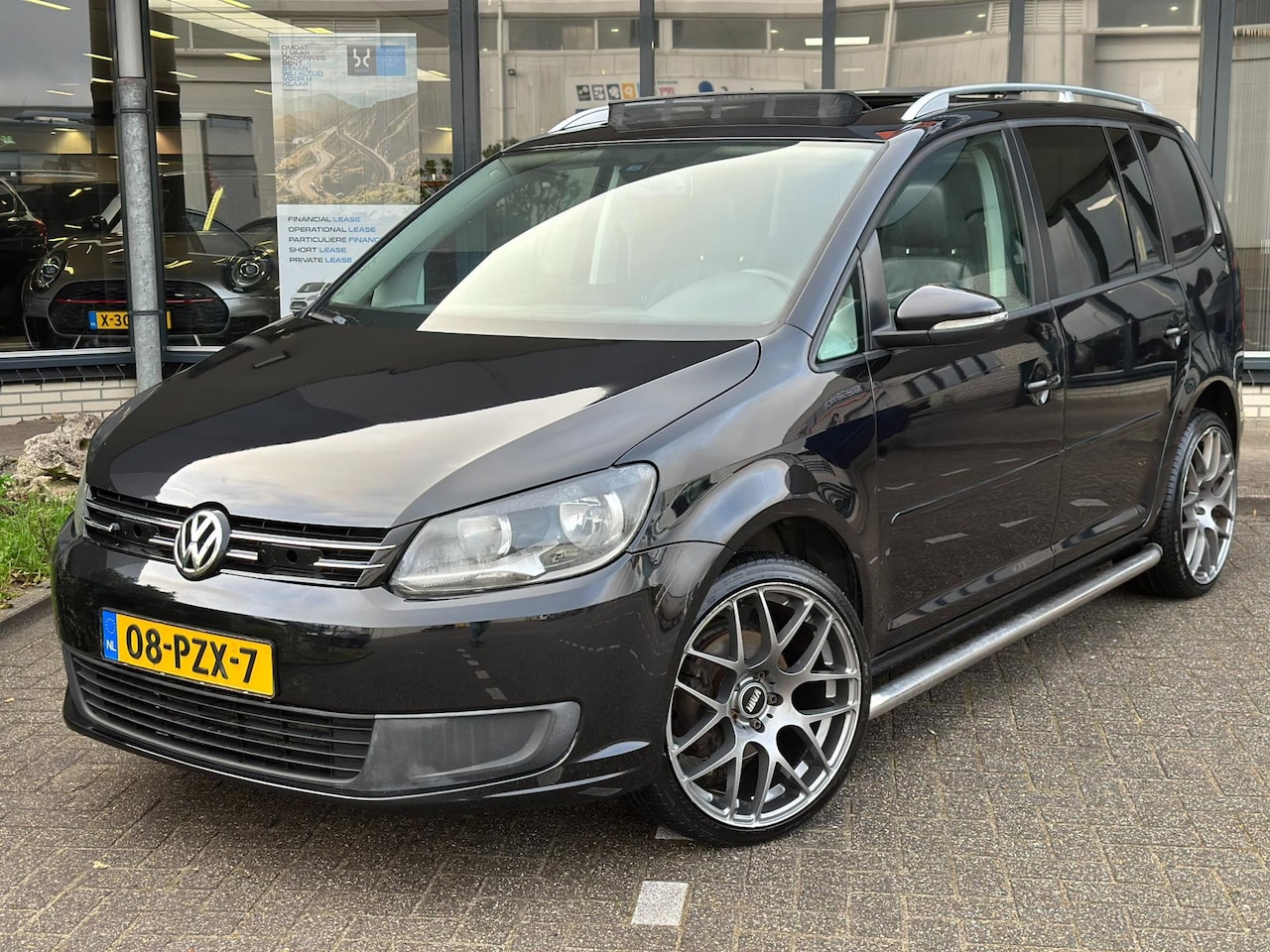 Volkswagen Touran - 1.2 TSI BMT Highline Xenon/PANO - AutoWereld.nl