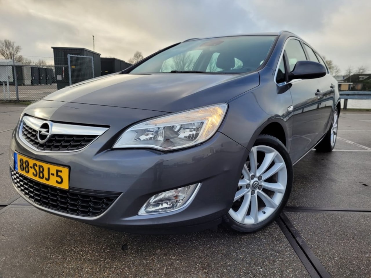 Opel Astra Sports Tourer - 1.4 Turbo Cosmo Leer - AutoWereld.nl