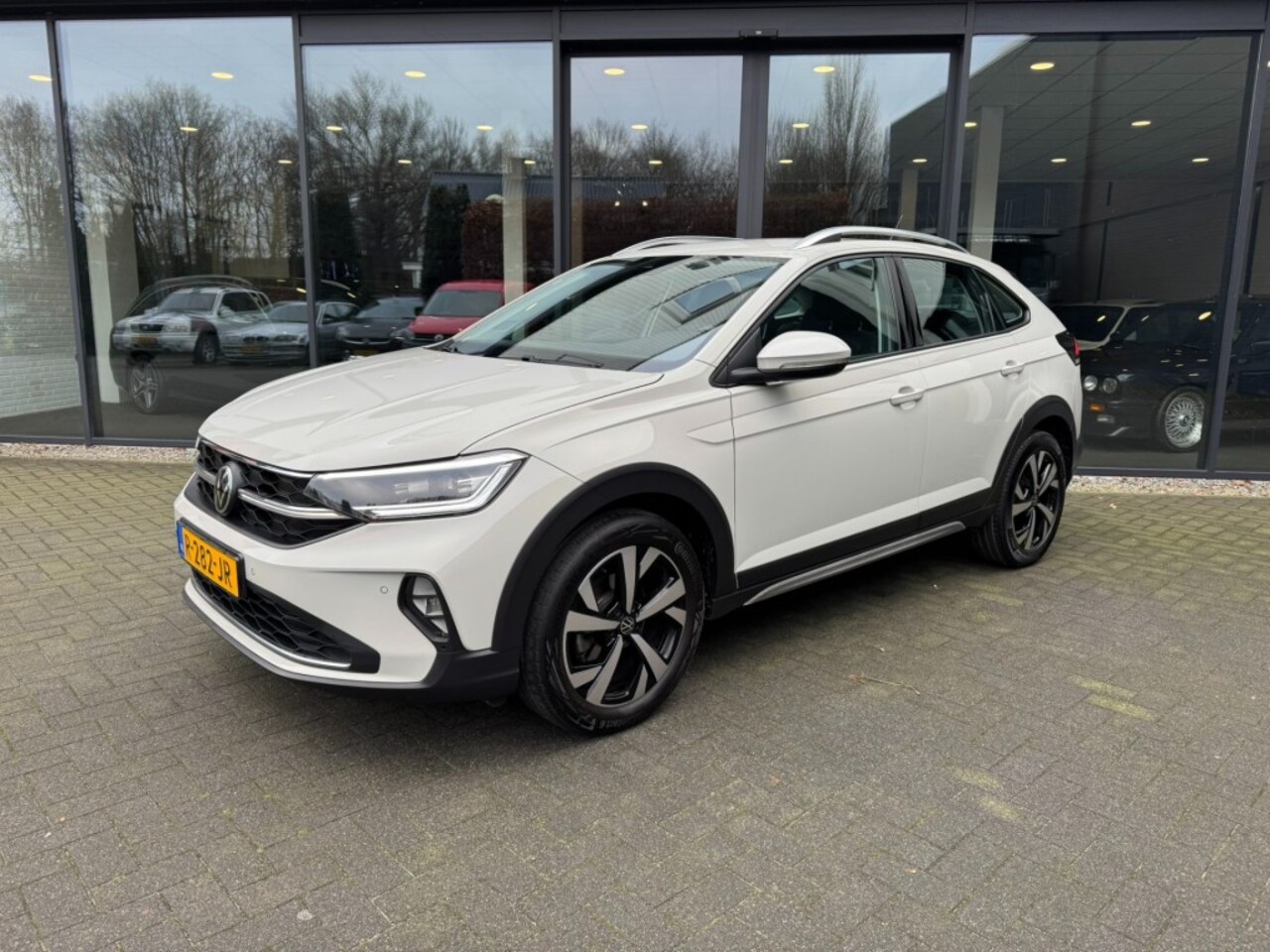 Volkswagen Taigo - 1.5 TSI Style 1.5 TSI Style,LED,Half Leer,Digi dash,Carplay,Clima,Adapt Cruise - AutoWereld.nl