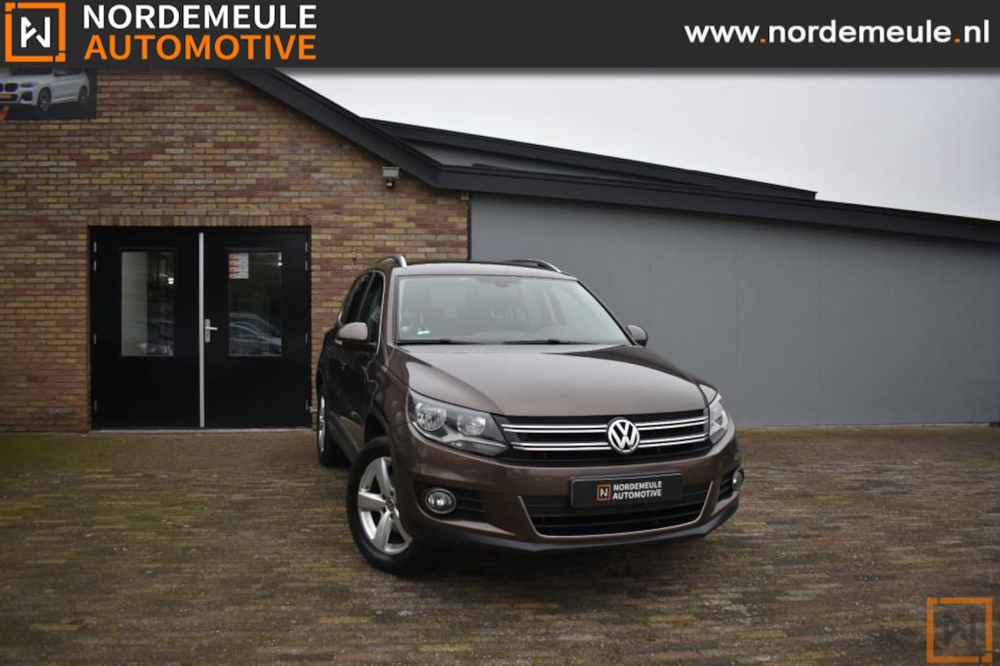 Volkswagen Tiguan - 2.0 TSI SPORTenST.4 Motion, AUT, Cruise - AutoWereld.nl