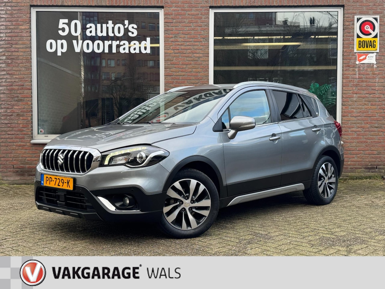 Suzuki S-Cross - 1.4 BOOSTJET HIGH EXECUTIVE | NAVI | TREKHAAK | LEER | CLIMA | PANORAMA | STOELVERWARMING - AutoWereld.nl