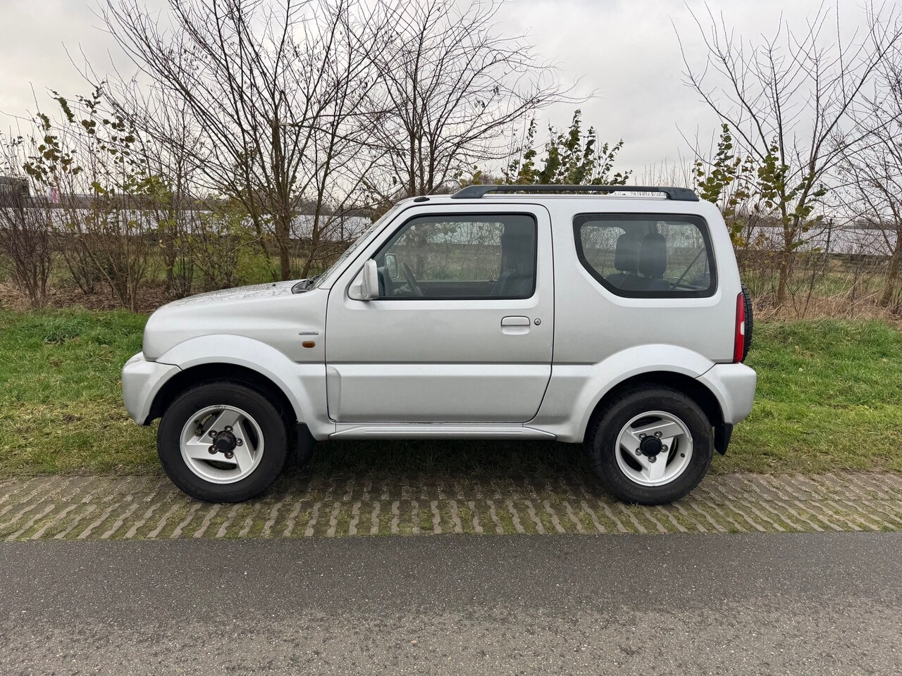 Suzuki Jimny - 1.3 JX 4WD 1.3 JX 4WD - AutoWereld.nl