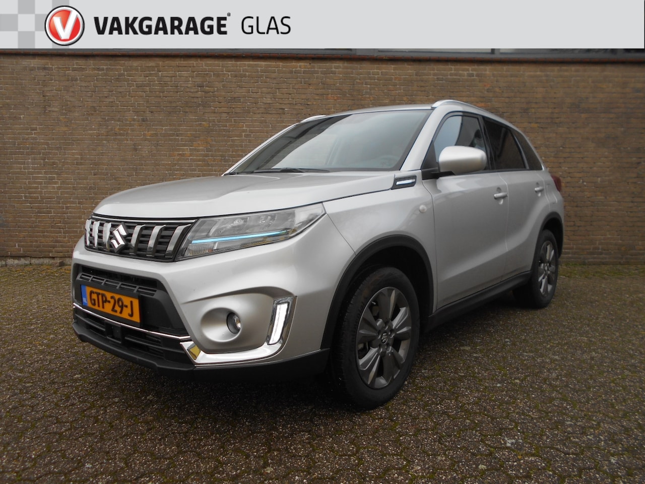 Suzuki Vitara - 1.4 129pk Smart Hybrid Style ECC / Navi / Apple Carplay / Camera - AutoWereld.nl