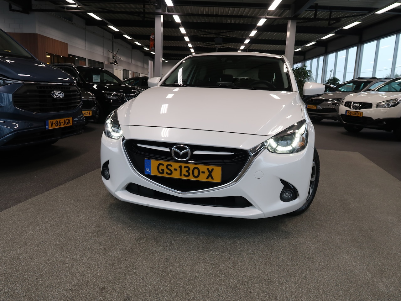 Mazda 2 - 1.5 Skyactiv-G 90pk GT-M 5-drs. LED/NAVI/CRUISE/CLIMA/PDC/STOELVERWARMING - AutoWereld.nl