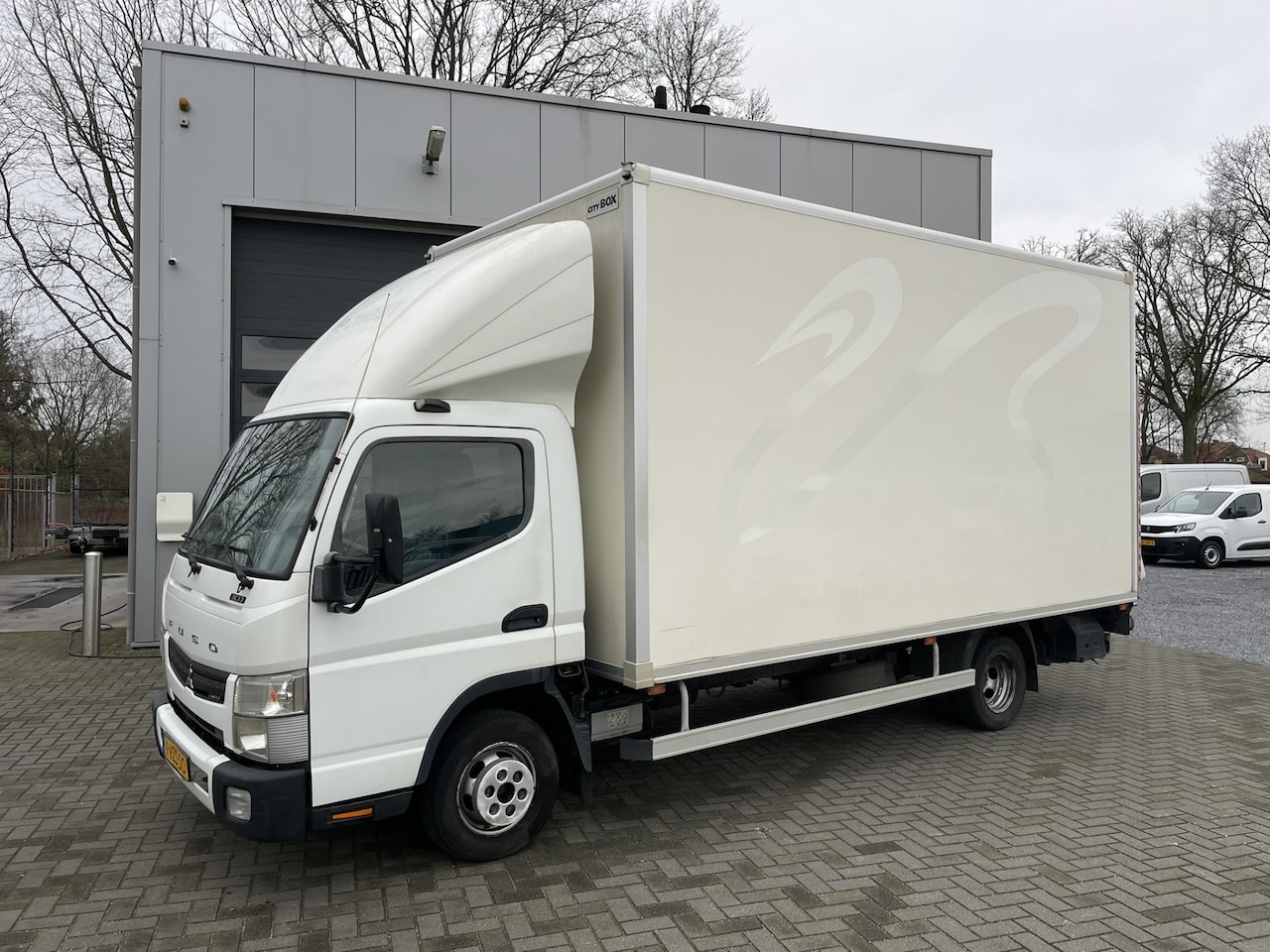 Mitsubishi Canter - 3C13 3.0 DI 385 Bakwagen met laadklep - AutoWereld.nl