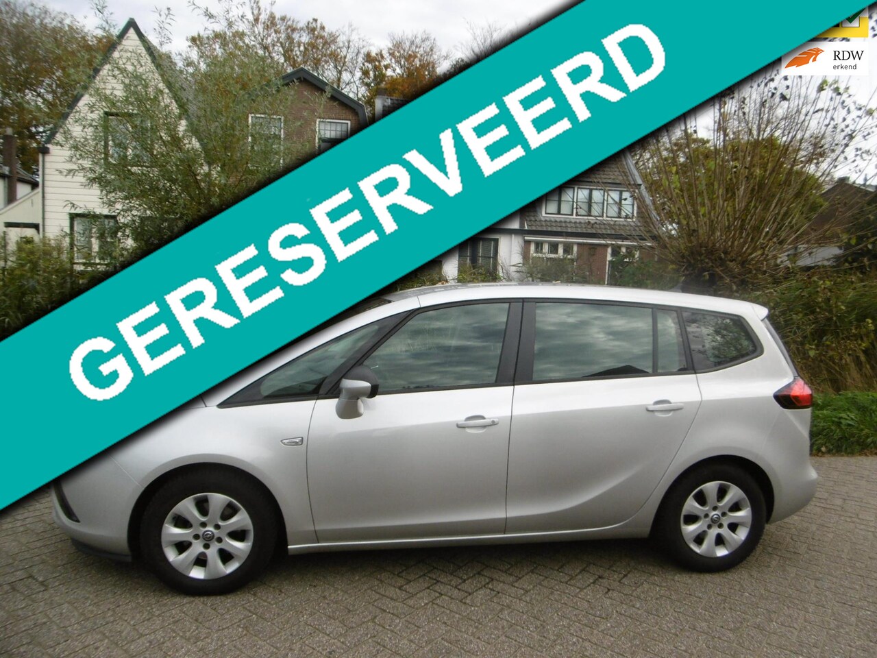 Opel Zafira Tourer - 1.4 Edition 140pk Clima Cruise Navi Trekhaak Hoge instap - AutoWereld.nl