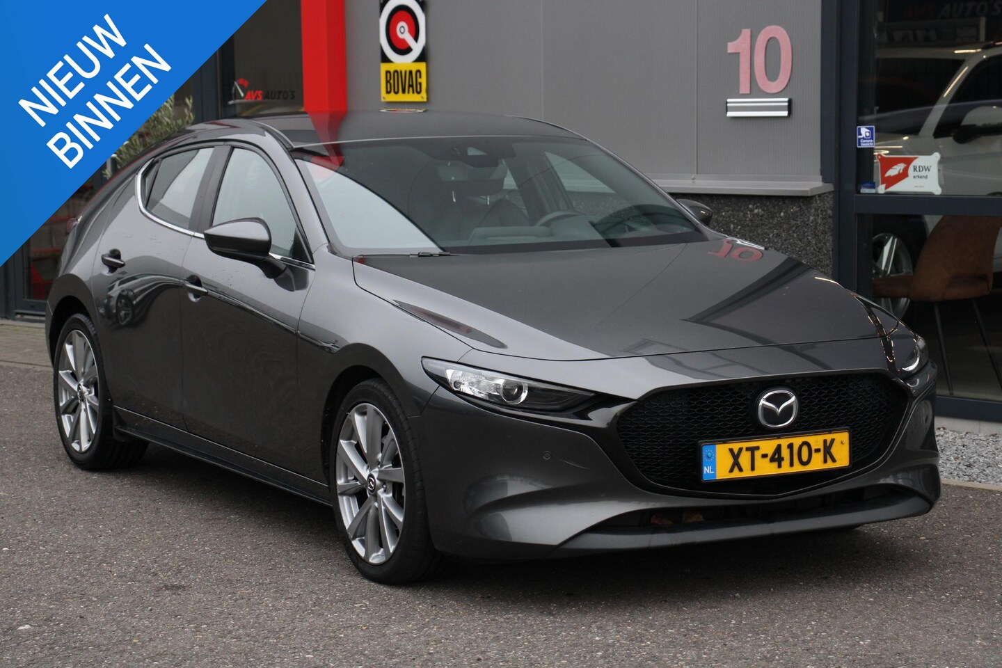 Mazda 3 - 2.0 e-SkyActiv-G M Hybrid 122 Comfort met Bose Leer, Head-up - AutoWereld.nl