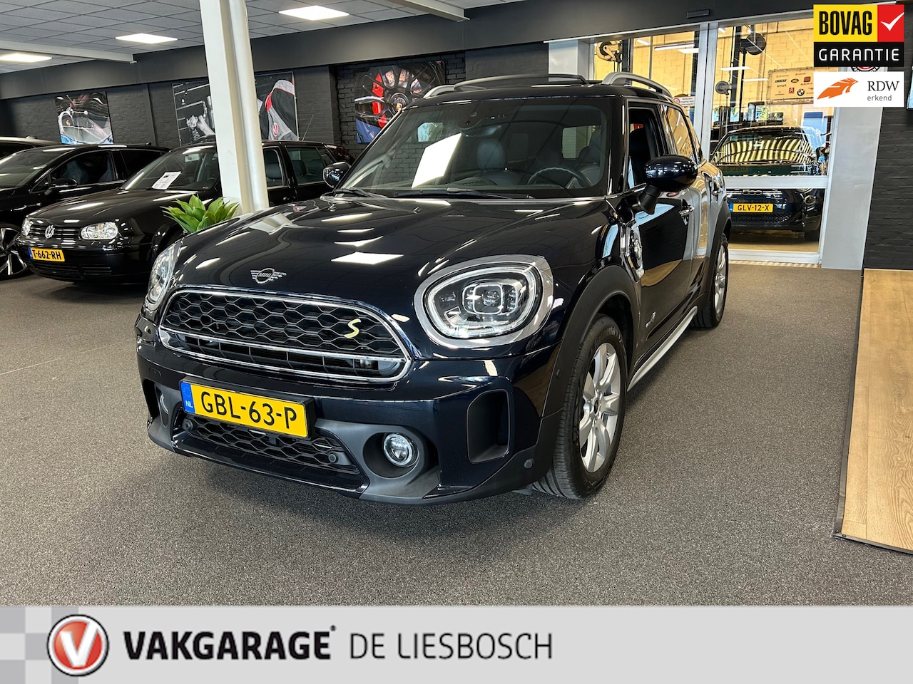 MINI Countryman - Mini 2.0 Cooper S E ALL4 Chili / Automaat / Leder / Panorama-dak / Led / stoelverwarming - AutoWereld.nl