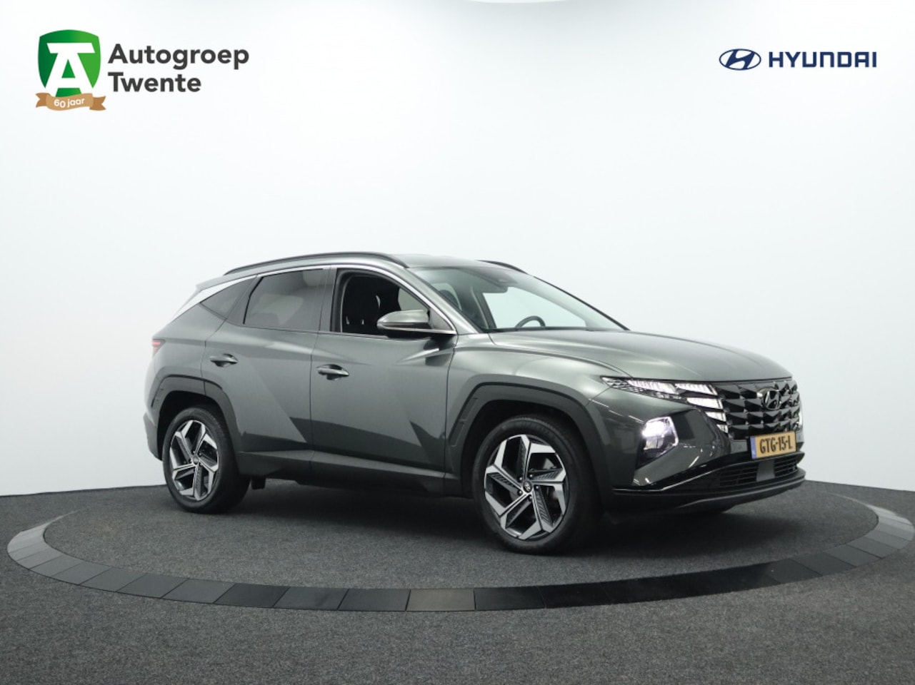 Hyundai Tucson - 1.6 HEV Comfort Smart | Navigatie | Camera | Cruise control - AutoWereld.nl