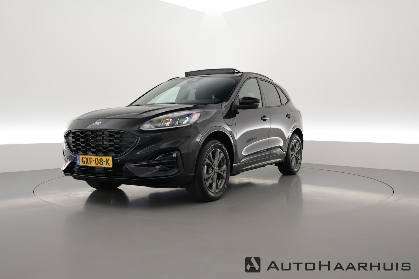 Ford Kuga - 2.5 PHEV ST-Line | Pano | Navi | Afn. Trekhaak | Camera | Stoelverw. | Keyless | - AutoWereld.nl