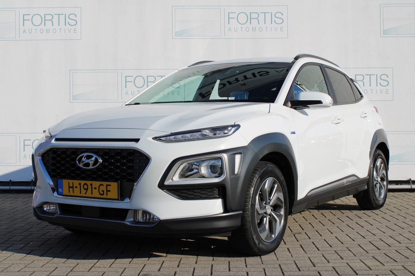 Hyundai Kona - 1.6 GDI HEV Fashion NL AUTO | TREKHAAK | CAMERA | - AutoWereld.nl