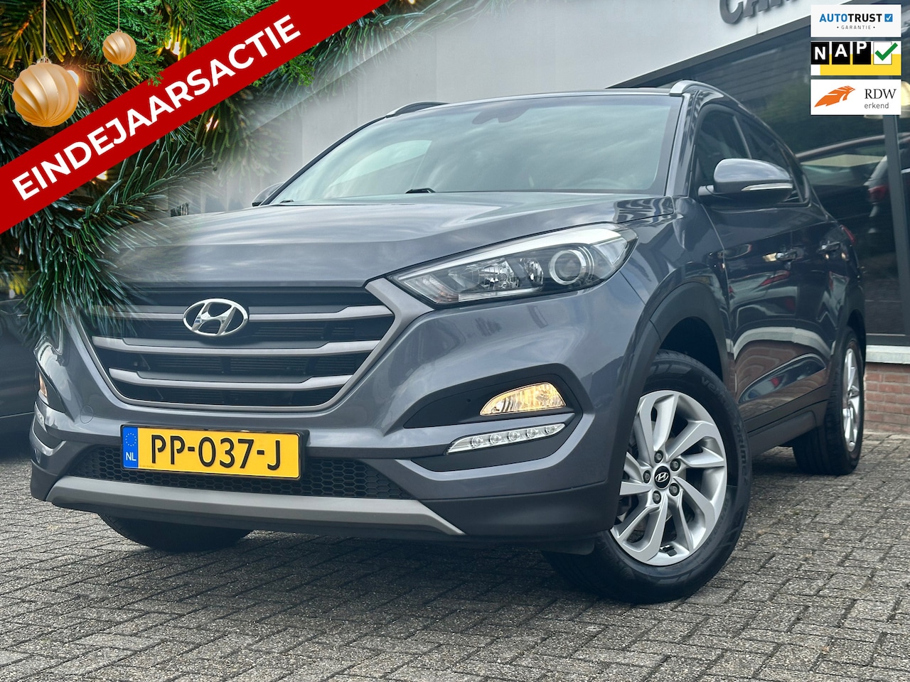 Hyundai Tucson - 1.6 GDi Anniversary Edition 2e EIG_NAVI_CRUIS_PDC_N.A.P. - AutoWereld.nl