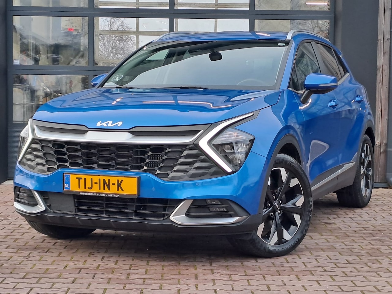 Kia Sportage - 1.6 T-GDi Plug-in Hybrid AWD DynamicPlusLine 265PK | Clima | Trekhaak | Stuur & stoelverwa - AutoWereld.nl