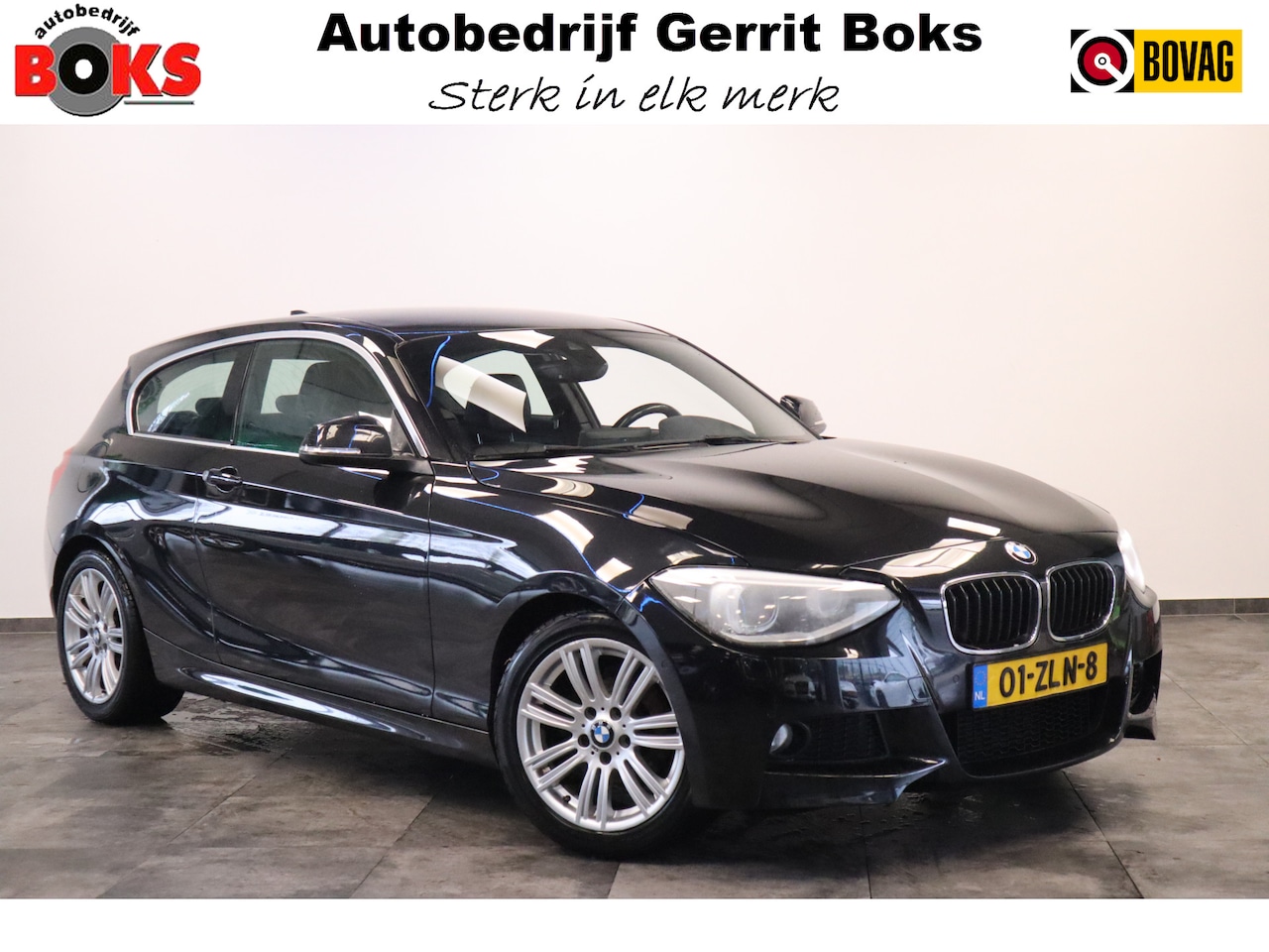 BMW 1-serie - 114i Business+ Leder interieur 17 LMV  Cruise control Navigatie - AutoWereld.nl