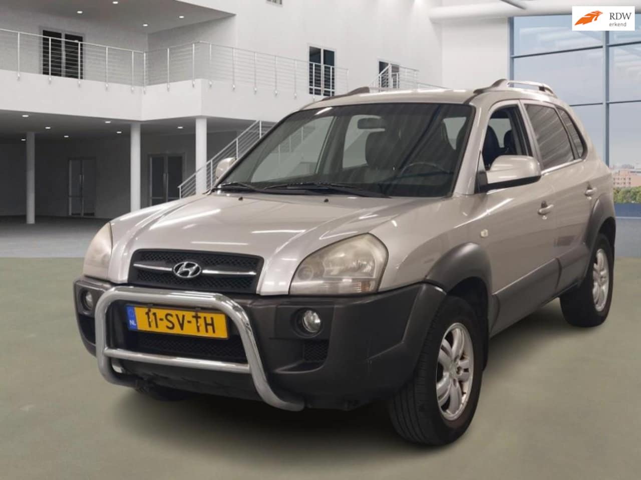 Hyundai Tucson - 2.0i Style World Cup PSENSOR LEDER CRUISE 2 X SLEUTELS - AutoWereld.nl