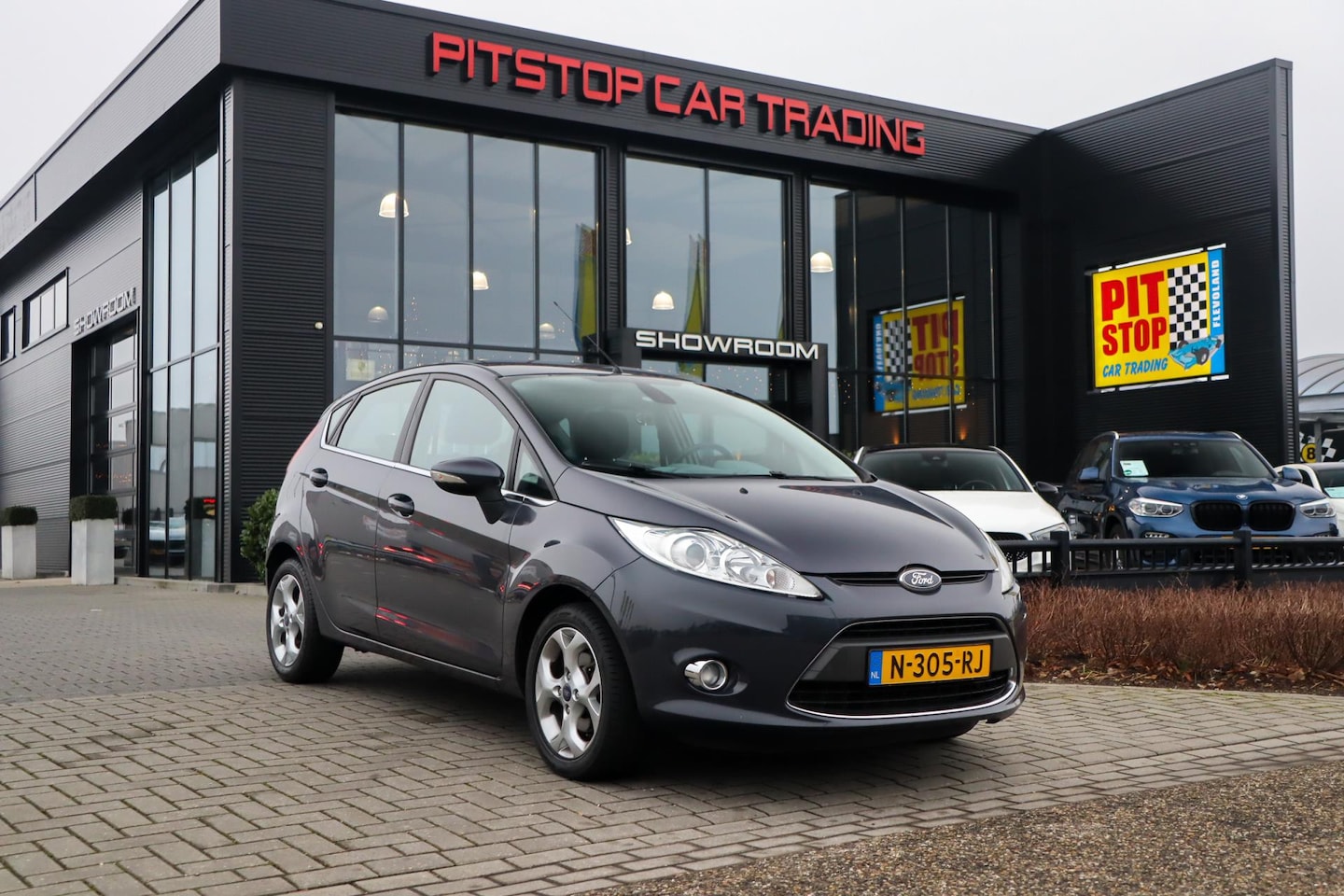 Ford Fiesta - 1.25 Ghia 1.25 Ghia, 82 PK, Dashcam, Stoelverwarming, Airco! - AutoWereld.nl