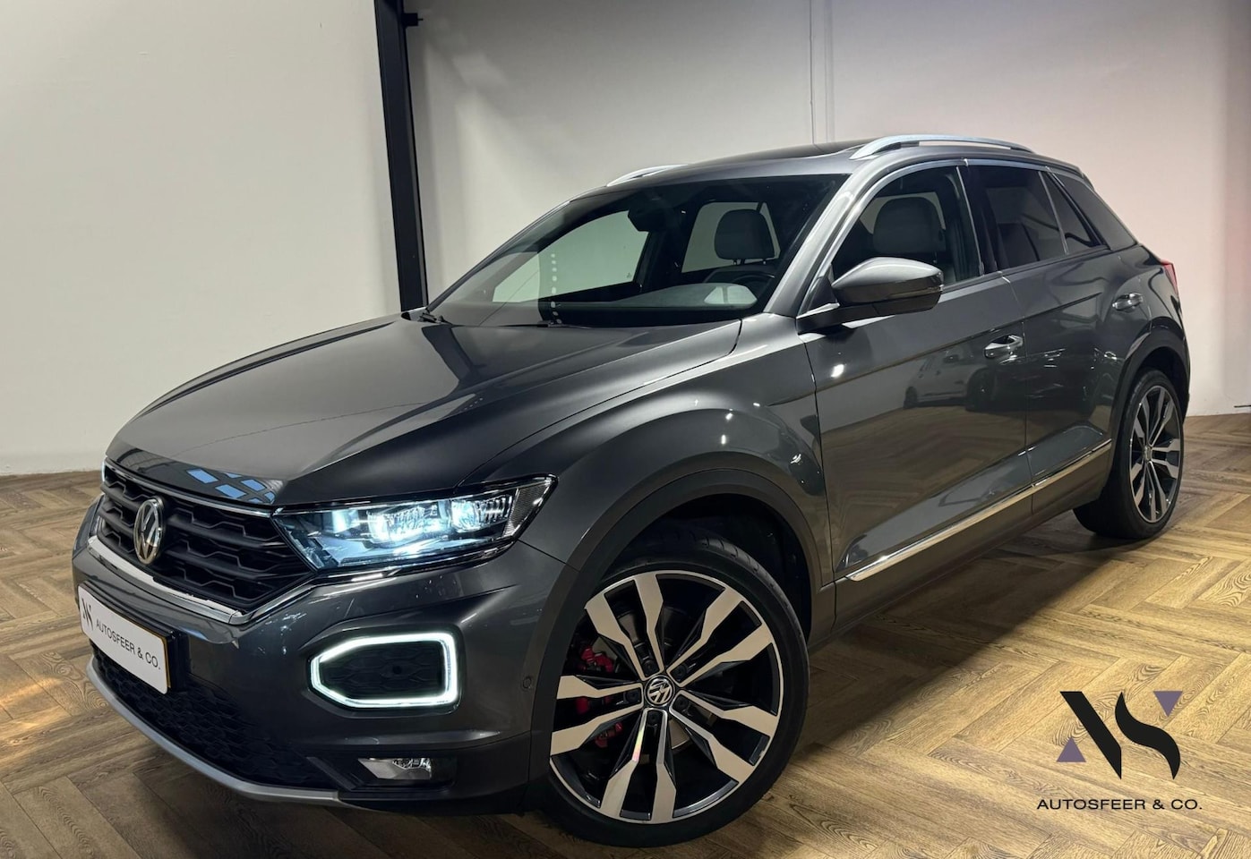 Volkswagen T-Roc - 2.0 TSI 4Motion Sport PANO BLINDSPOT - AutoWereld.nl