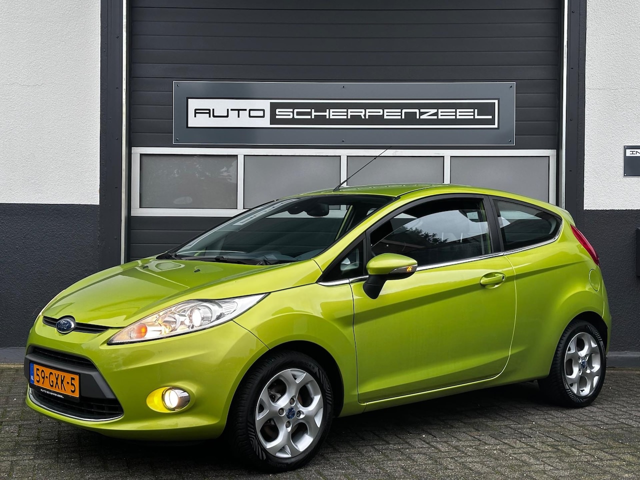 Ford Fiesta - 1.25 Titanium I AIRCO I CRUISE I SQUEEZ GREEN I NL AUTO - AutoWereld.nl