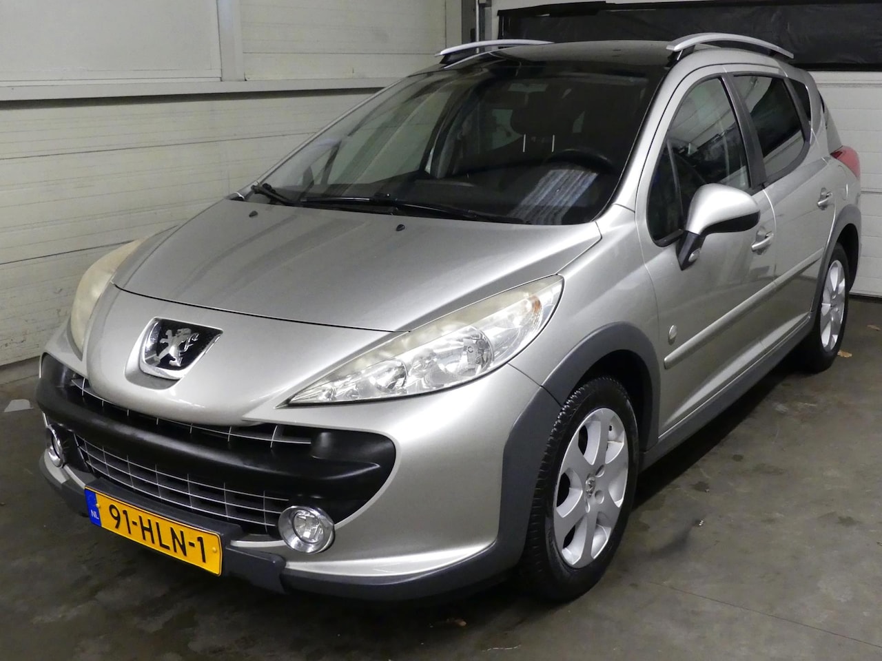 Peugeot 207 SW Outdoor - 1.6 VTi XS - Airco - Cruise Control - Half Leer - Trekhaak - AutoWereld.nl