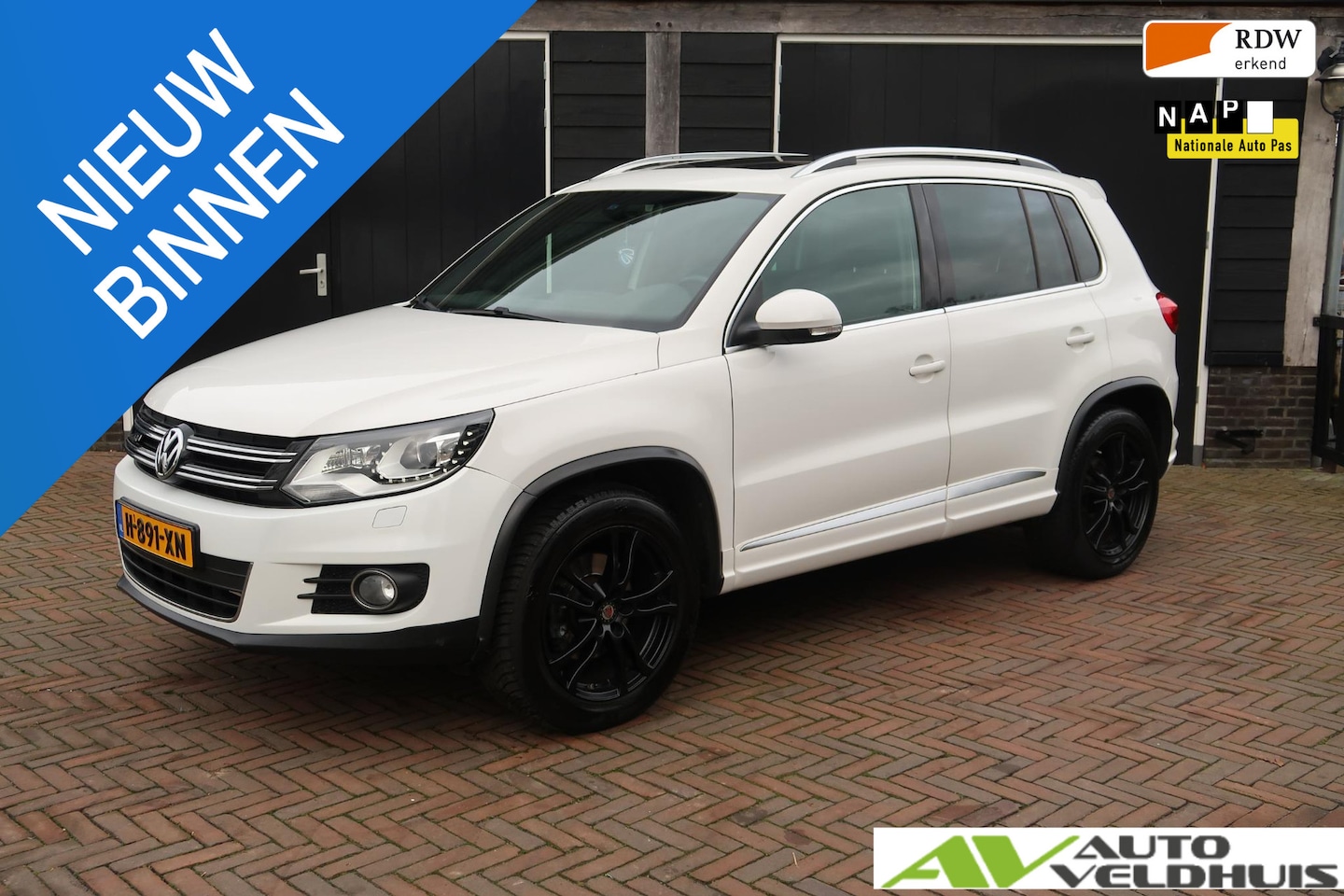 Volkswagen Tiguan - 1.4 TSI Sport&Style 4motion R-line Edition - AutoWereld.nl