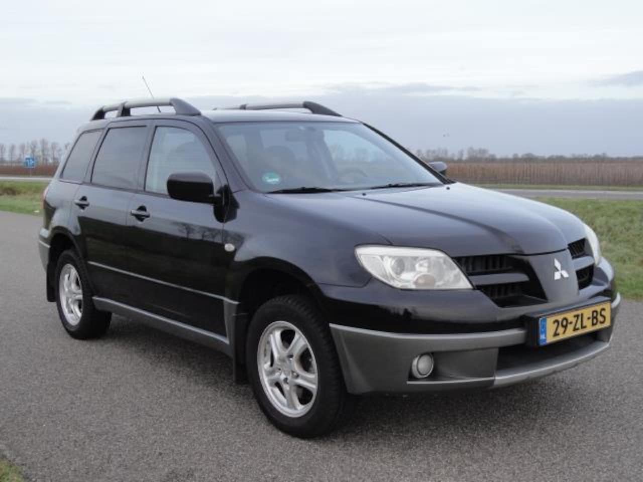 Mitsubishi Outlander Sport - 2.0 Invite+ BJ2008 met Airco / Elektr ramen / Trekhaak - AutoWereld.nl