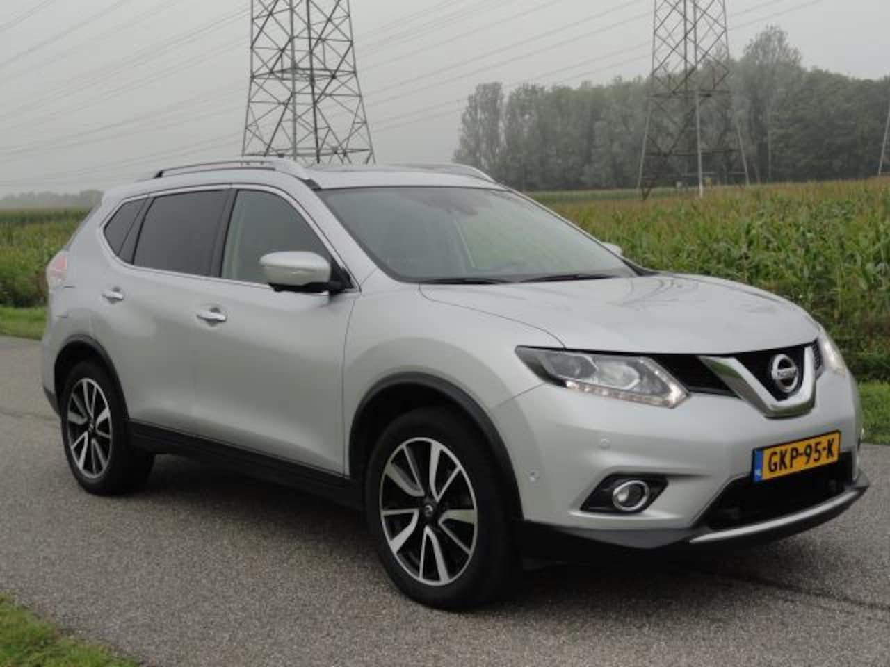 Nissan X-Trail - 1.6 DIG-T Tekna full option ECC + NAVIG + 360 + PANO - AutoWereld.nl