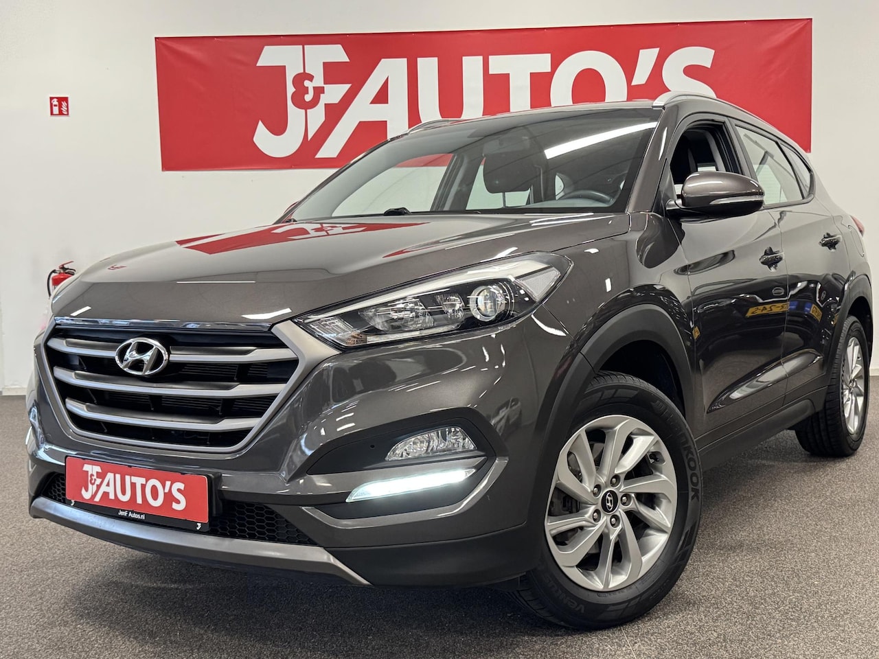 Hyundai Tucson - 1.6 GDi Premium NAVIGATIE/CAMERA, ECC AIRCO, CRUISE - AutoWereld.nl