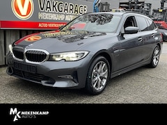 BMW 3-serie Touring - 330e Sport Line 17"/Adaptieve cruise/Sfeerverlichting/Stoelverwarming/PDC v+a/Sportstoelen