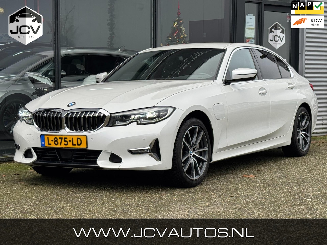 BMW 3-serie - 330e High Executive LEER/CARPLAY/CAMERA/PDC - AutoWereld.nl