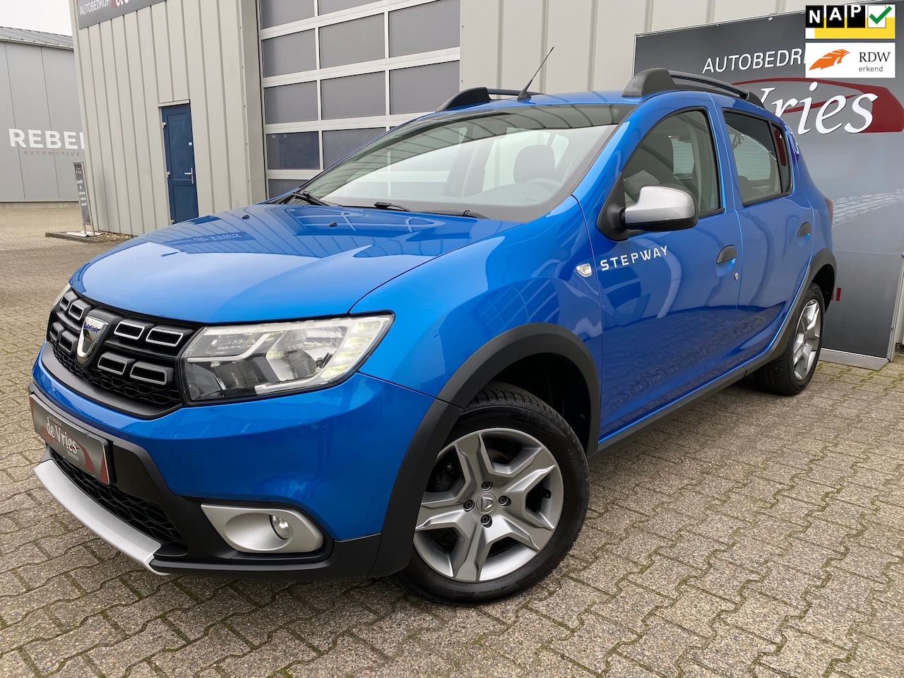 Dacia Sandero Stepway - 0.9 TCe SL / Airco / Navi / Cruise / Camera / Trekhaak / PDC - AutoWereld.nl