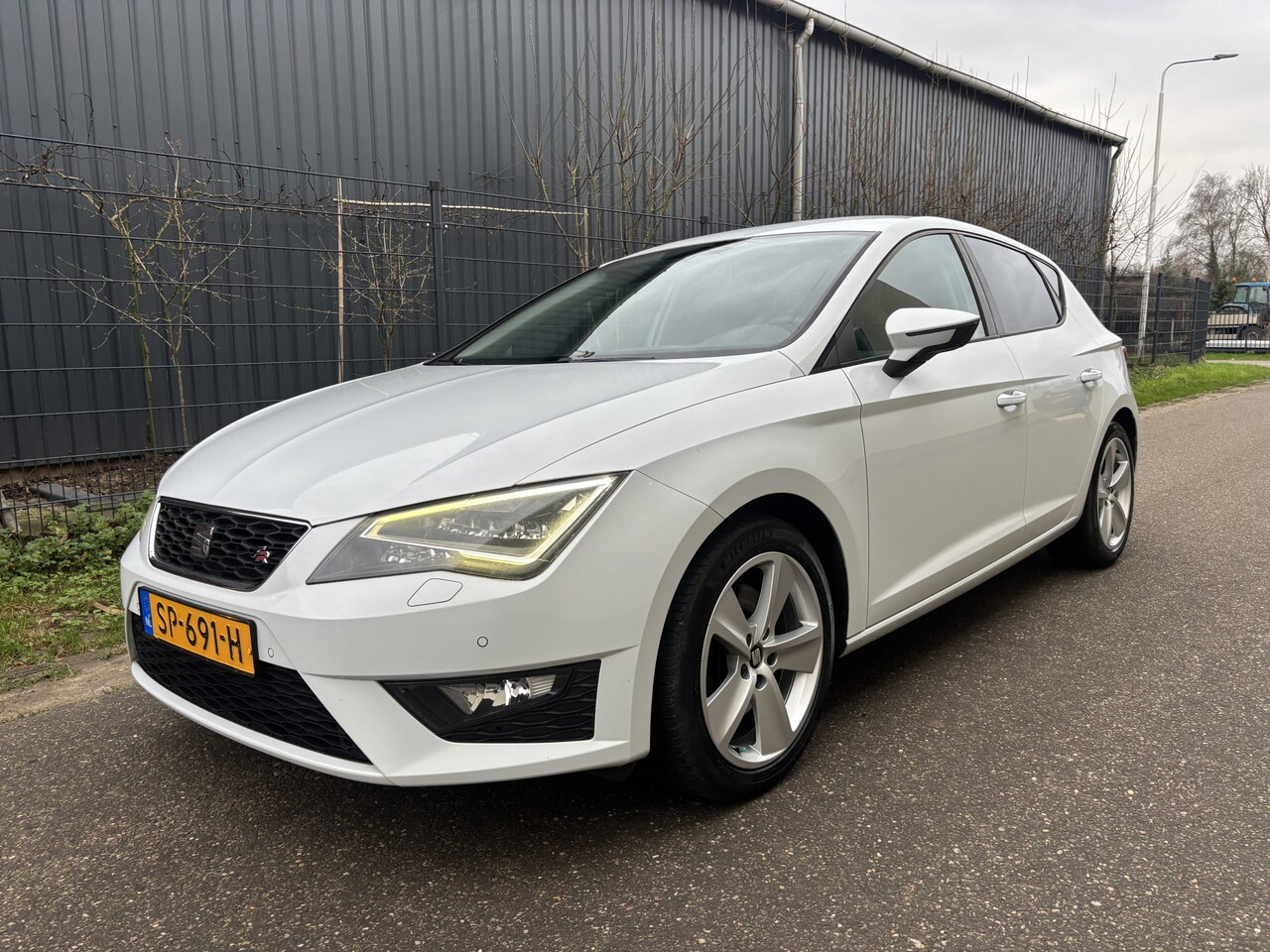 Seat Leon - 1.8 TSI FR Business / NAVI / CRUISE / STOELVERWARMING / 143dkm! - AutoWereld.nl