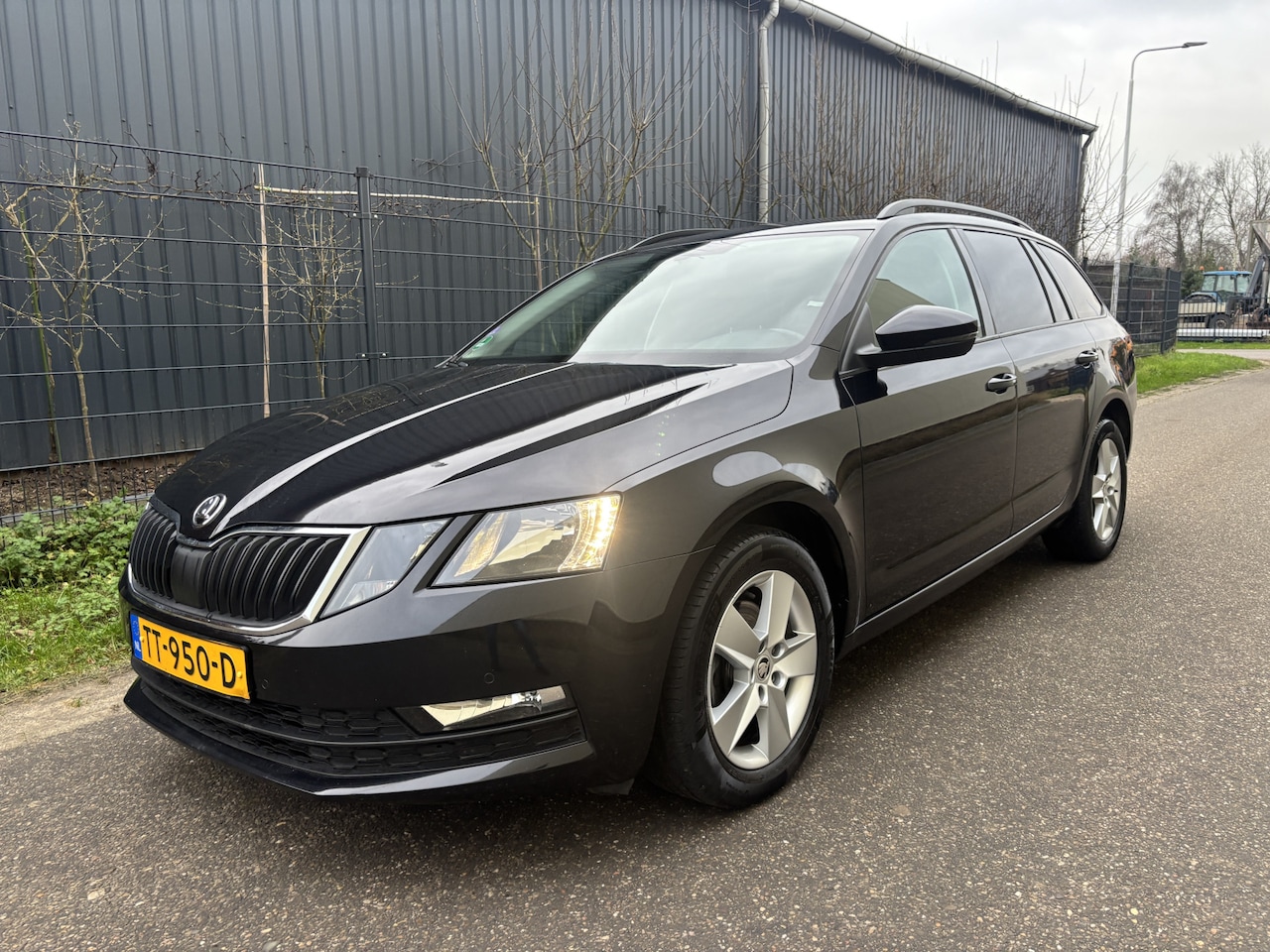 Skoda Octavia Combi - 1.0 TSI Greentech Ambition Business / AUTOMAAT / NAVI / STOELVERWARMING / CRUISE - AutoWereld.nl