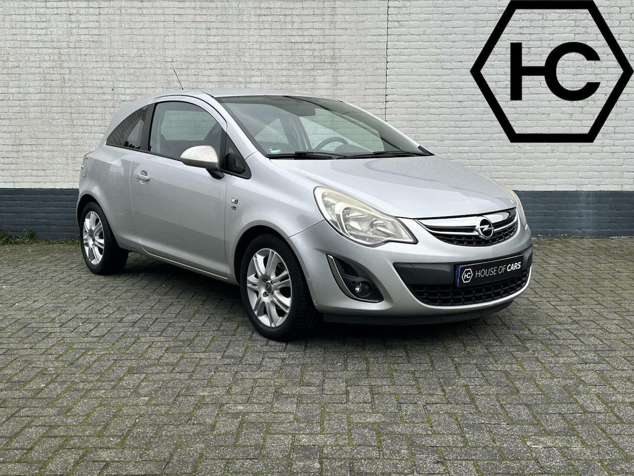 Opel Corsa - 1.2 Anniversary Edition Airco Cruise Leder - AutoWereld.nl