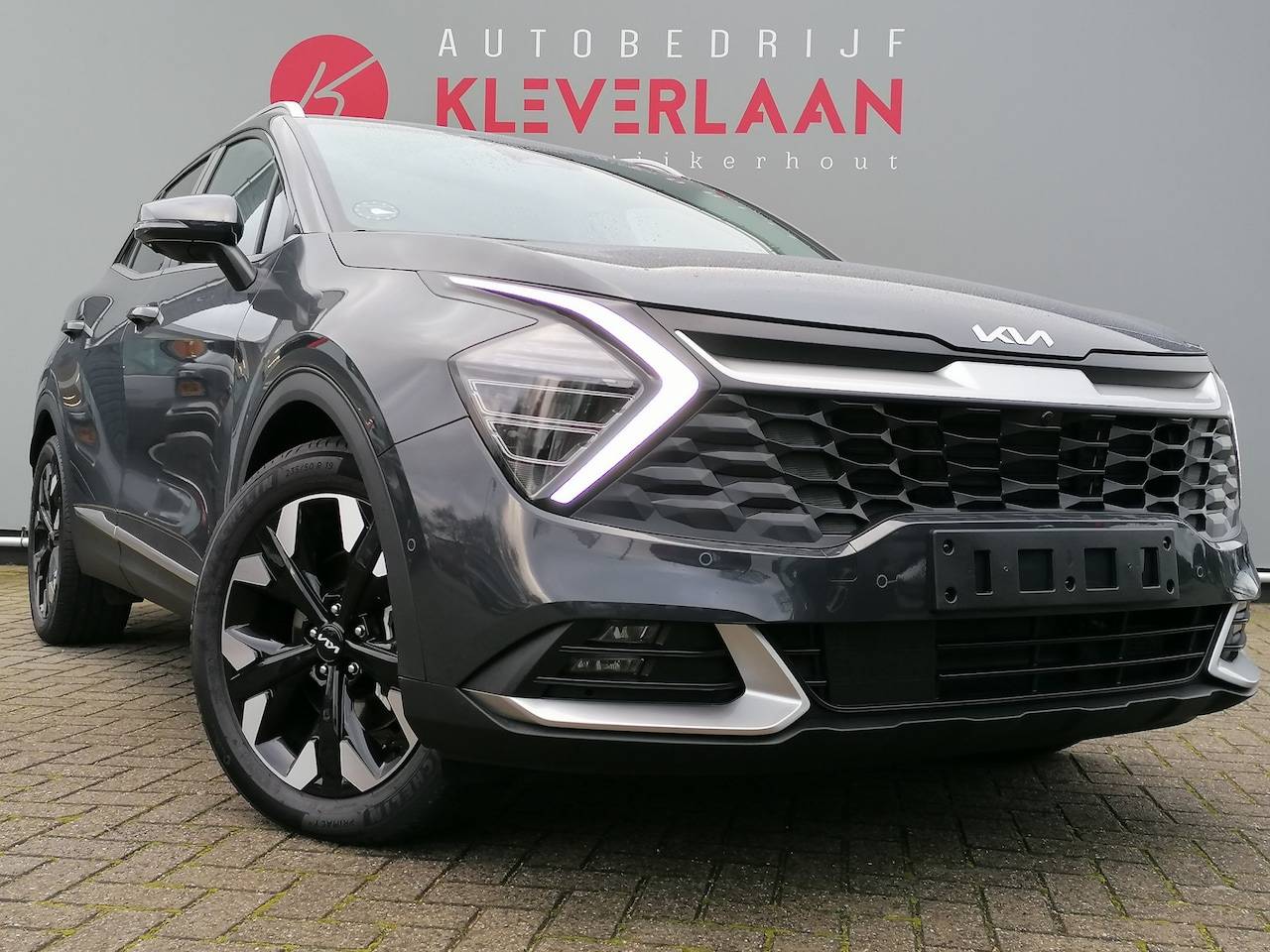 Kia Sportage - 1.6 T-GDi Plug-in Hybrid AWD DynamicPlusLine | 360 CAMERA | DRAADLOOS TEL LADER | VOOR + A - AutoWereld.nl