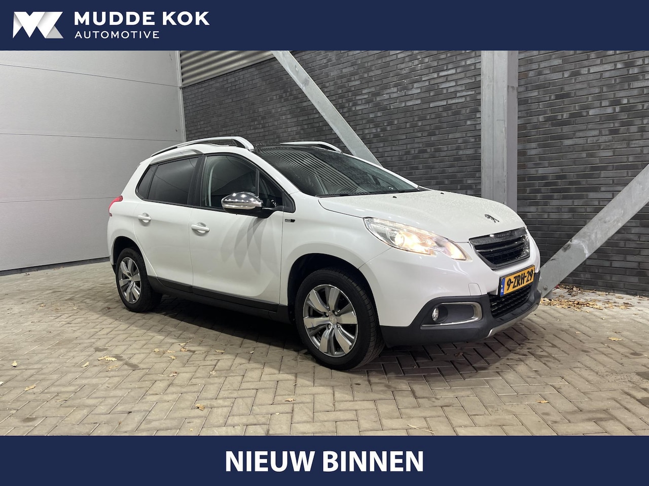 Peugeot 2008 - 1.2 PureTech Style | Panoramadak | Climate Control | Navigatie | Getint Glas | Cruise Cont - AutoWereld.nl