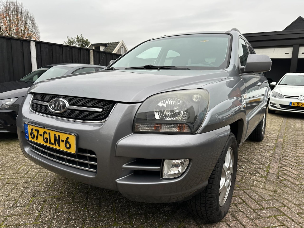 Kia Sportage - 2.0 CVVT X-cite LPG-G3-CLIMA-PDC-LEDER-CRUISE - AutoWereld.nl