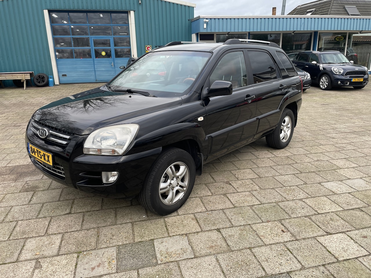 Kia Sportage - 2.0 CVVT M-bition 2.0 CVVT M-bition - AutoWereld.nl