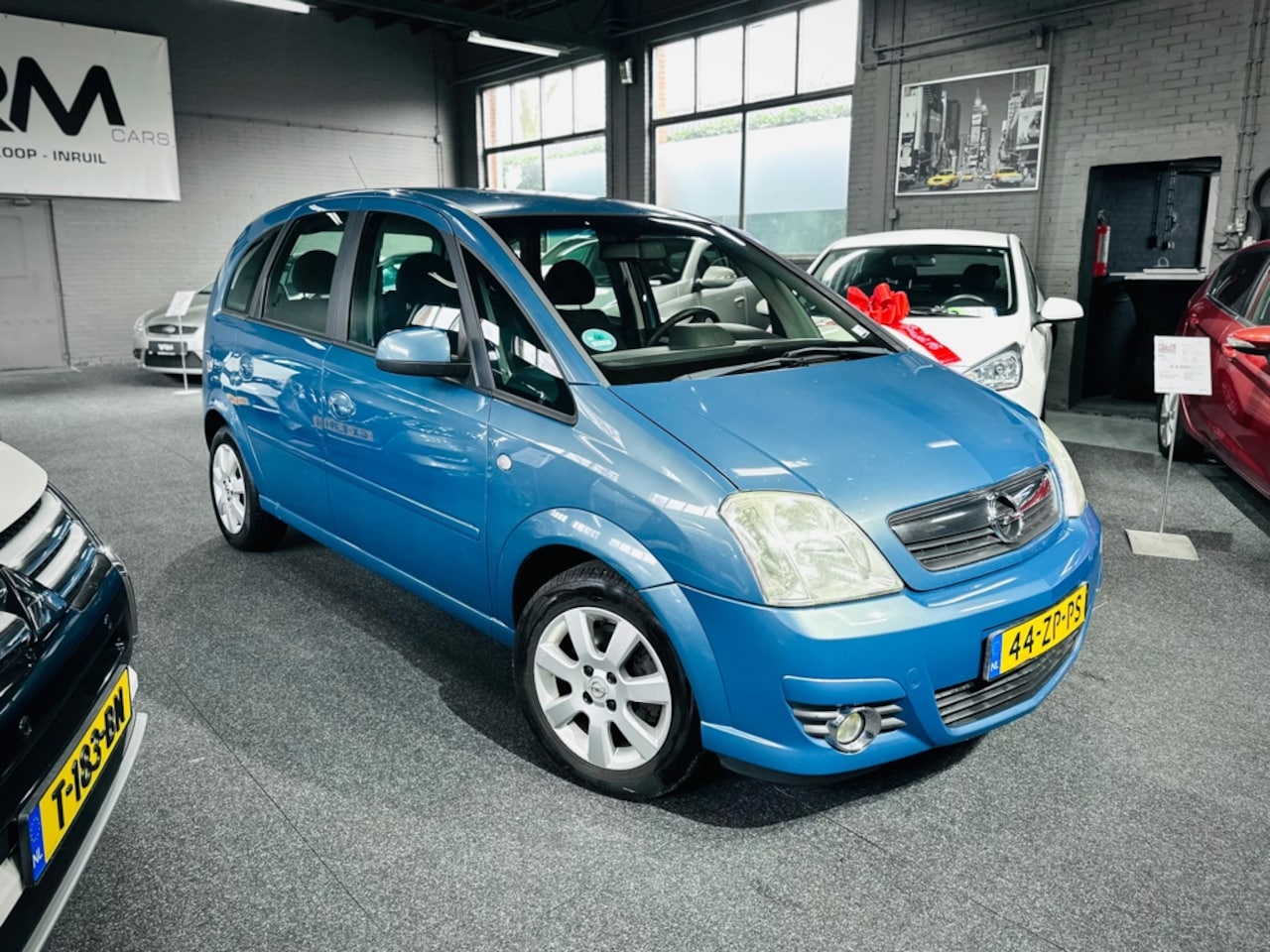 Opel Meriva - 1.8-16V Cosmo - Climate Control - Afneembaar trekhaak - Elk. Ramen - APK - LM Velgen - AutoWereld.nl