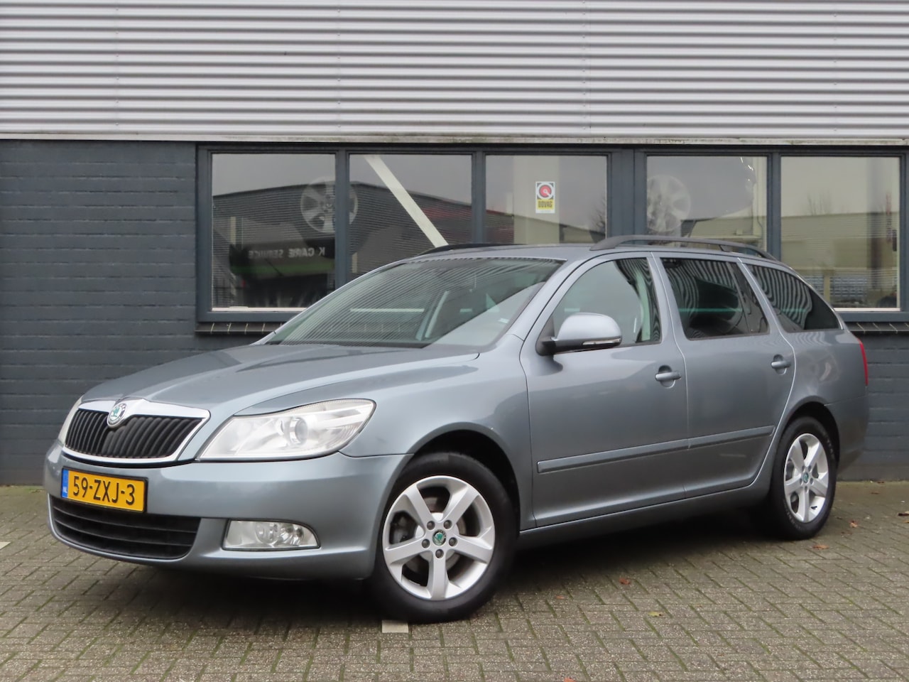 Skoda Octavia Combi - 1.2 TSI Arctic | navigatie | stoelverwarming | automatische airco | parkeersensoren - AutoWereld.nl