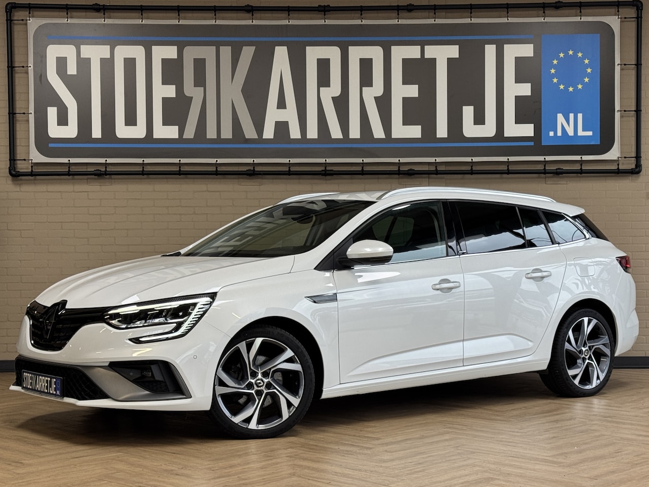 Renault Mégane E-Tech - Estate 1.6 PHEV 160pk R.S. Line | Groot navi | Bose | 18 inch | Blindspot | Camera | PDC | - AutoWereld.nl