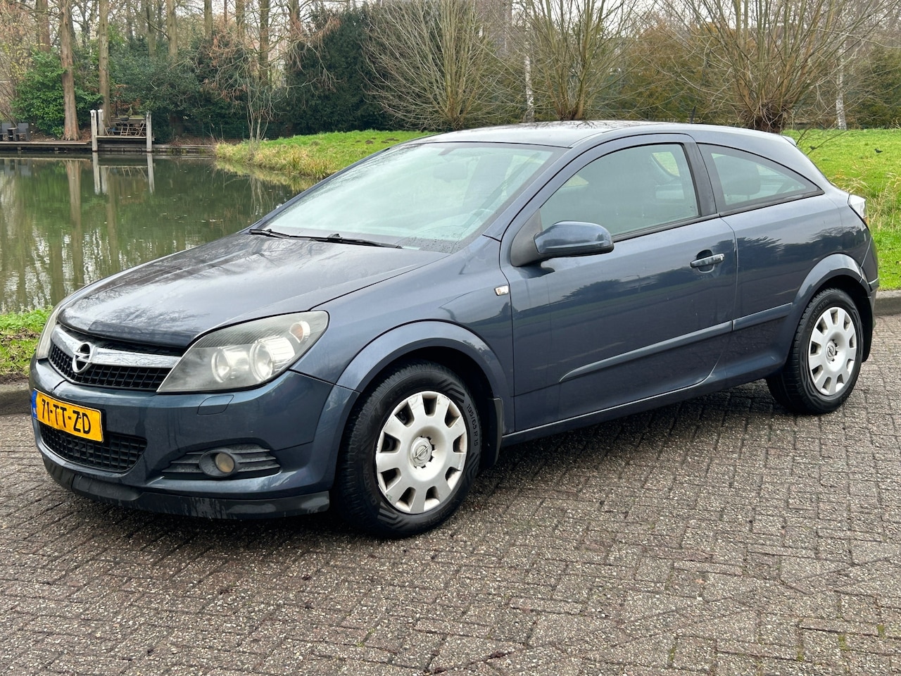 Opel Astra GTC - 1.6 Sport 2007 Airco! Goed rijdend! Nap! - AutoWereld.nl