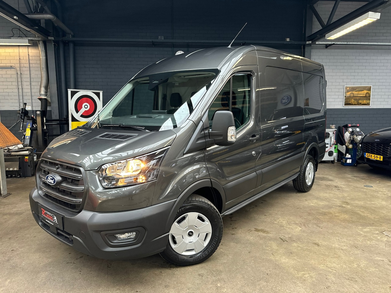 Ford Transit - 350 2.0 TDCI L2H2 Trend 165pk Autom 5jhr of 200dkm gar,FACELIFTCamera A,Cruise+Climate Con - AutoWereld.nl