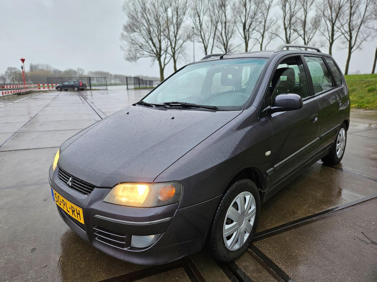 Mitsubishi Space Star - 1.6 Invite Silver LPG/Benzine - AutoWereld.nl