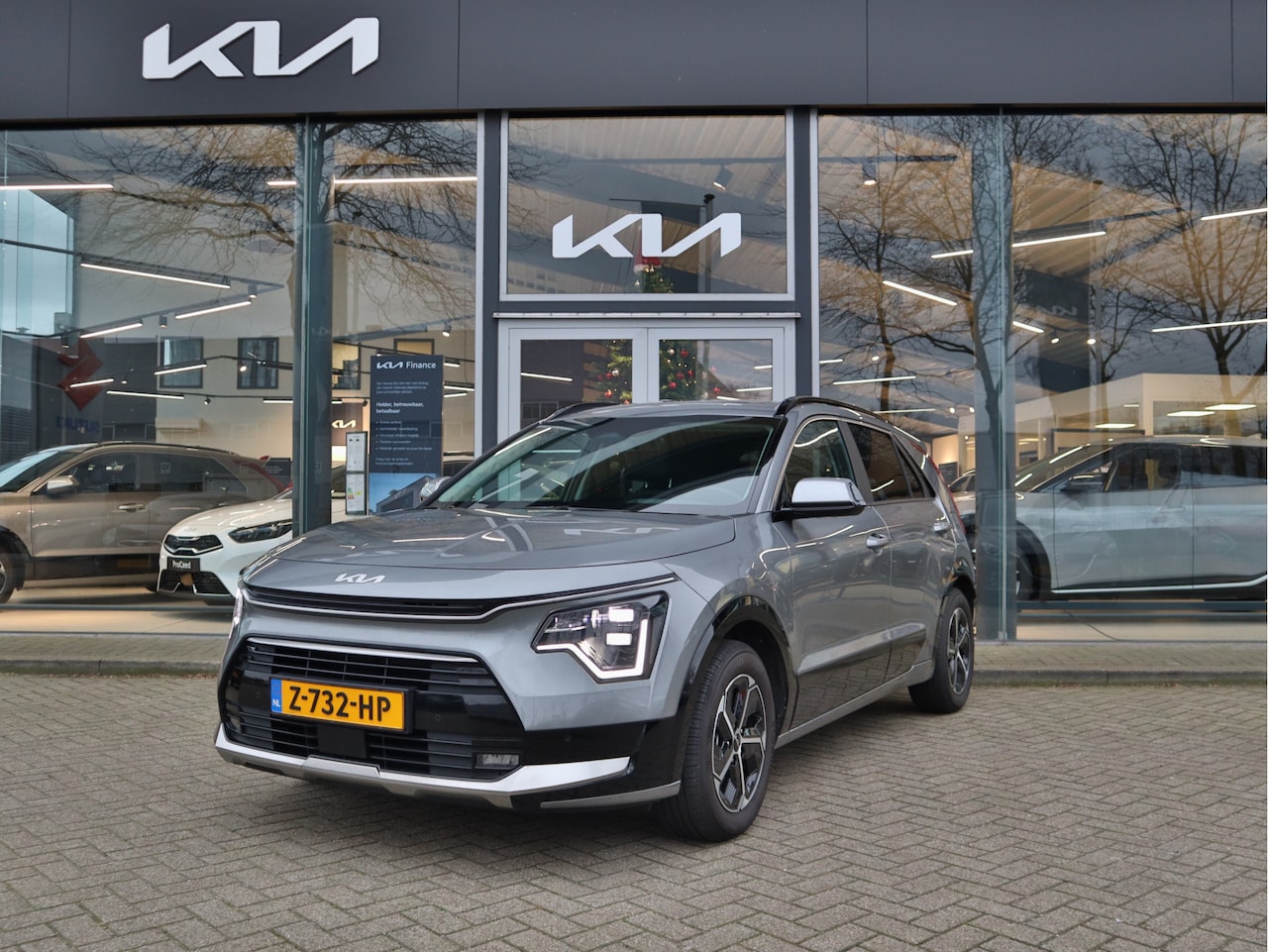 Kia Niro - 1.6 GDi Hybrid DynamicPlusLine 4.348km! Navi+BT+Cam Leder Stoel+Stuurverw. Leder LED HUD 1 - AutoWereld.nl