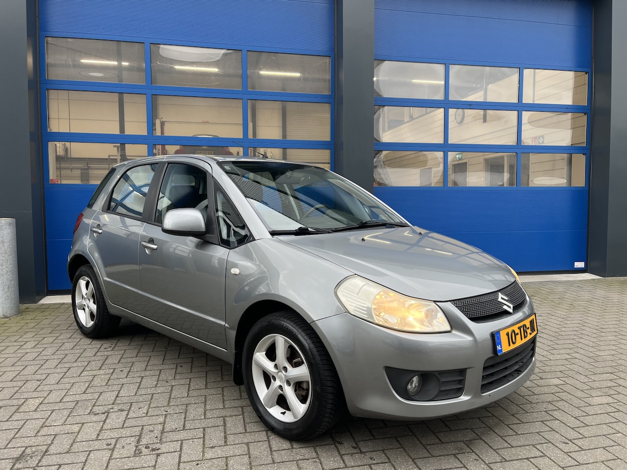 Suzuki SX4 - 1.6 108pK Automaat/ Airco/ Trekhaak/ Nwe APK/ Exclusive - AutoWereld.nl