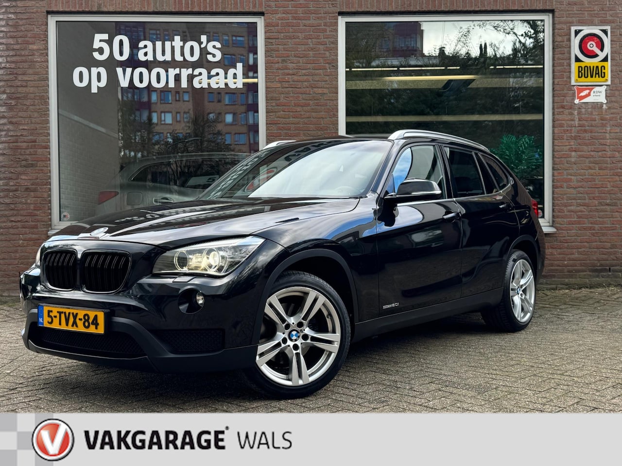 BMW X1 - SDRIVE 20i CHROME LINE | AIRCO | NAVI | CRUISE | PDC | VELGEN | TREKHAAK - AutoWereld.nl