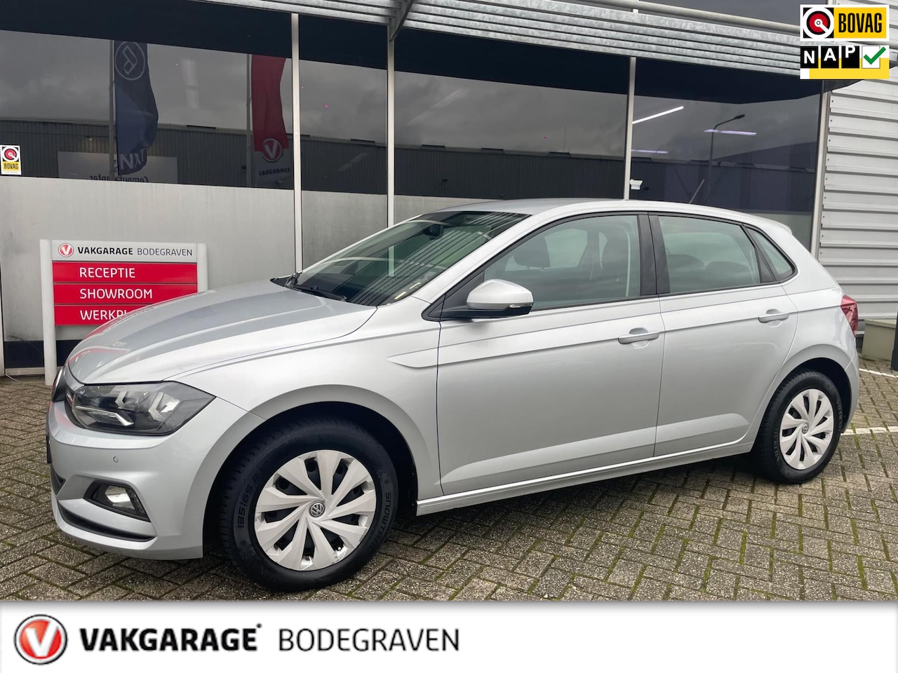 Volkswagen Polo - 1.0 TSI Comfortline / navigatie / parkeerhulp / CARPLAY - AutoWereld.nl