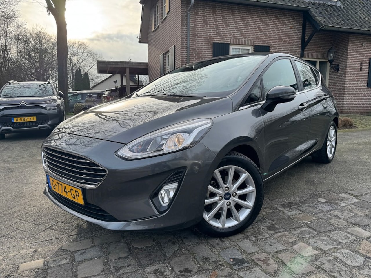 Ford Fiesta - 1.0 EcoBoost Titanium 101pk ecc,lmv,carplay,cruise - AutoWereld.nl