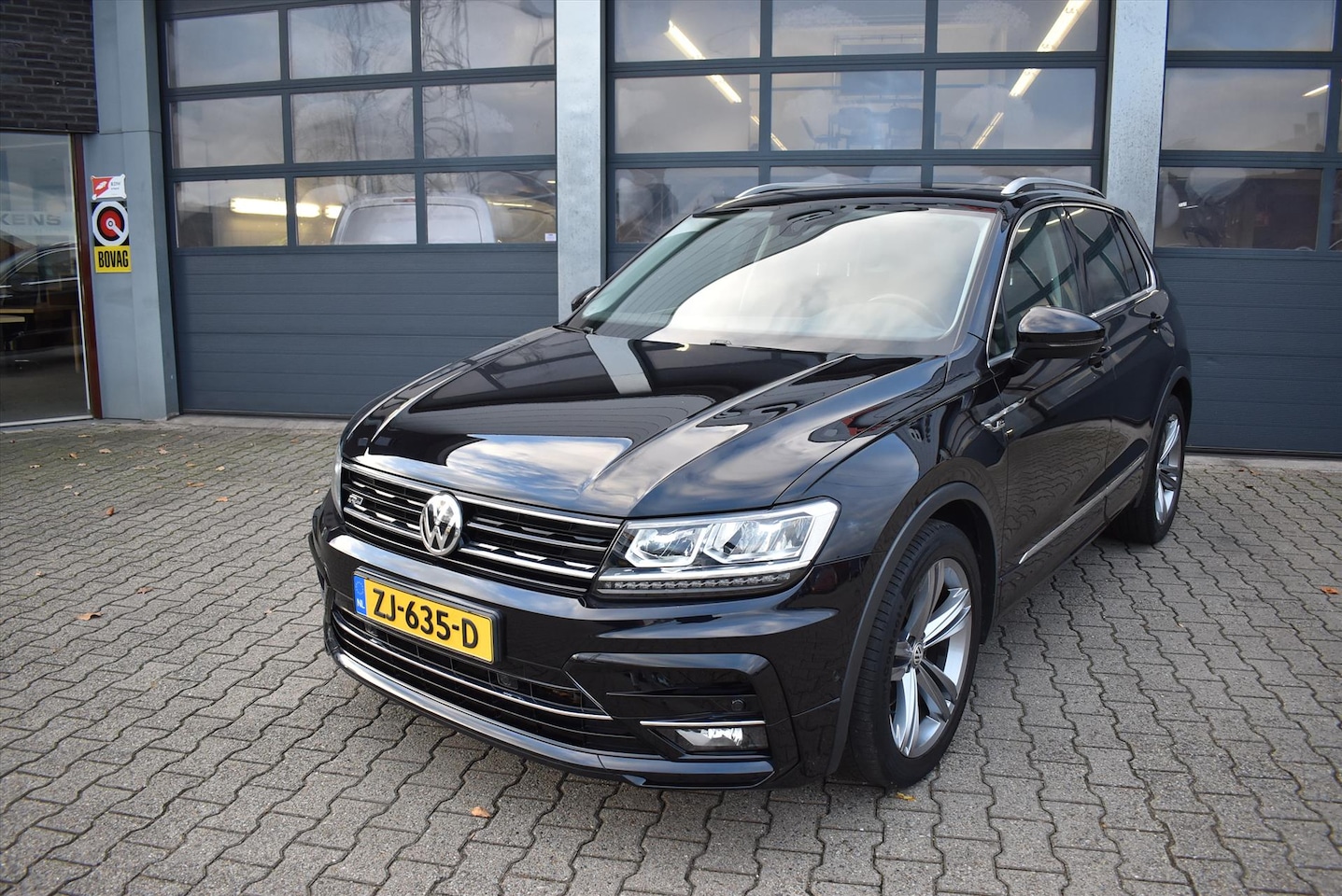 Volkswagen Tiguan - 1.5 TSI ACT 150pk DSG Highline Business R - AutoWereld.nl